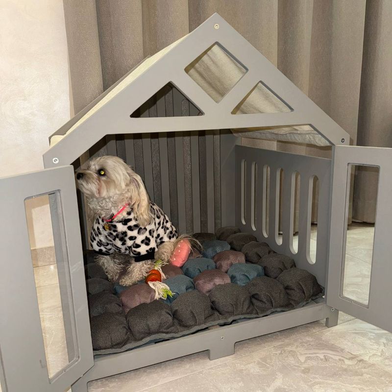 Soft pet cushion in wooden kennel crate for dogs