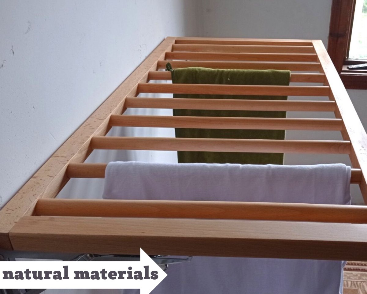 Wooden clothes airer fixed to laundry room wall
