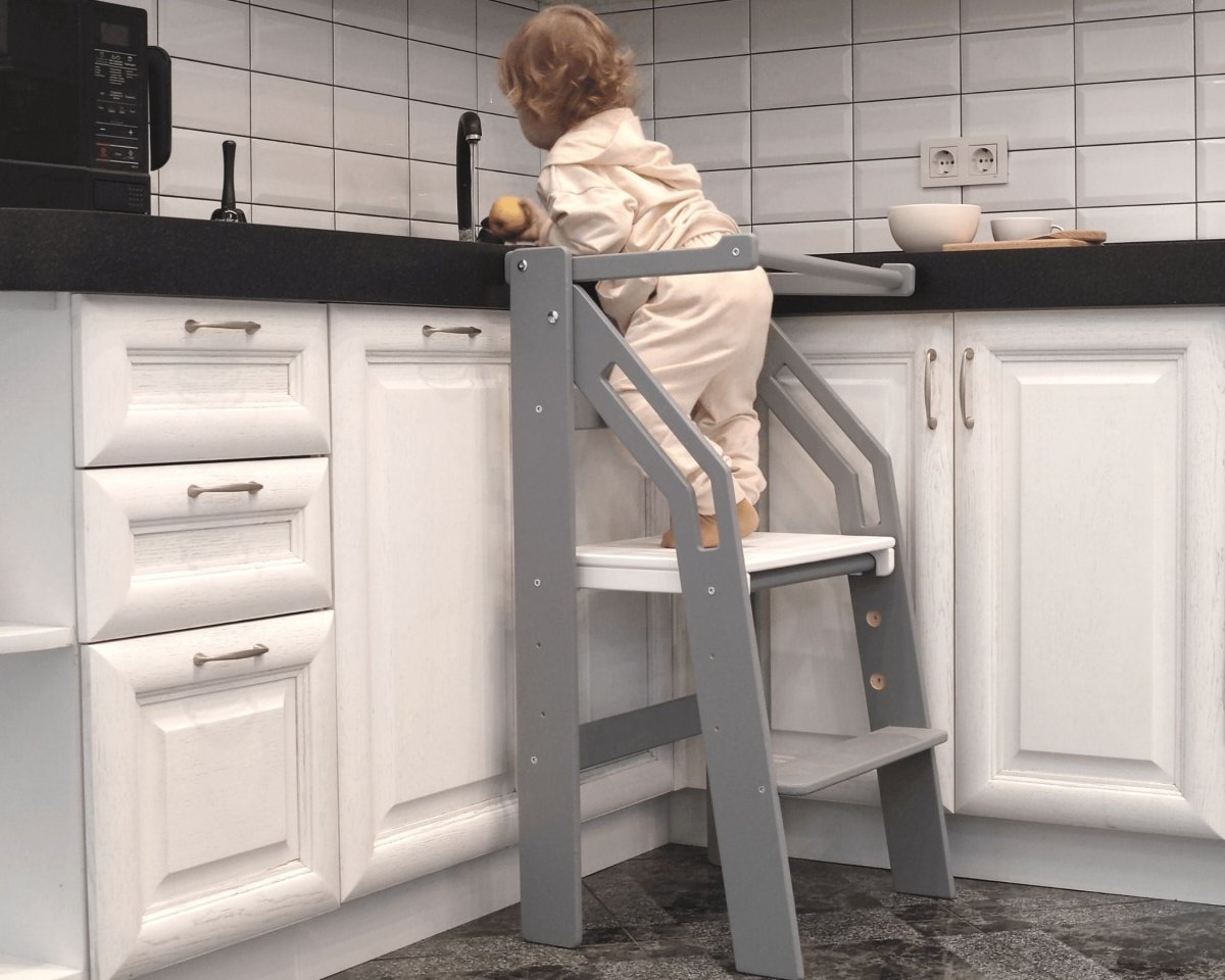 Wooden toddler chair with footrest and safety handles
