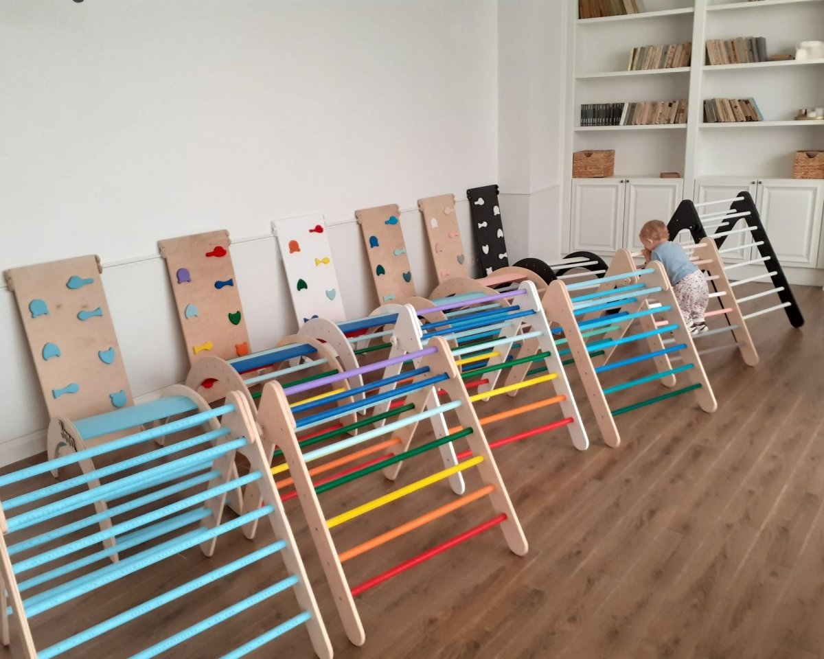 Kids indoor playground with wooden balance beam