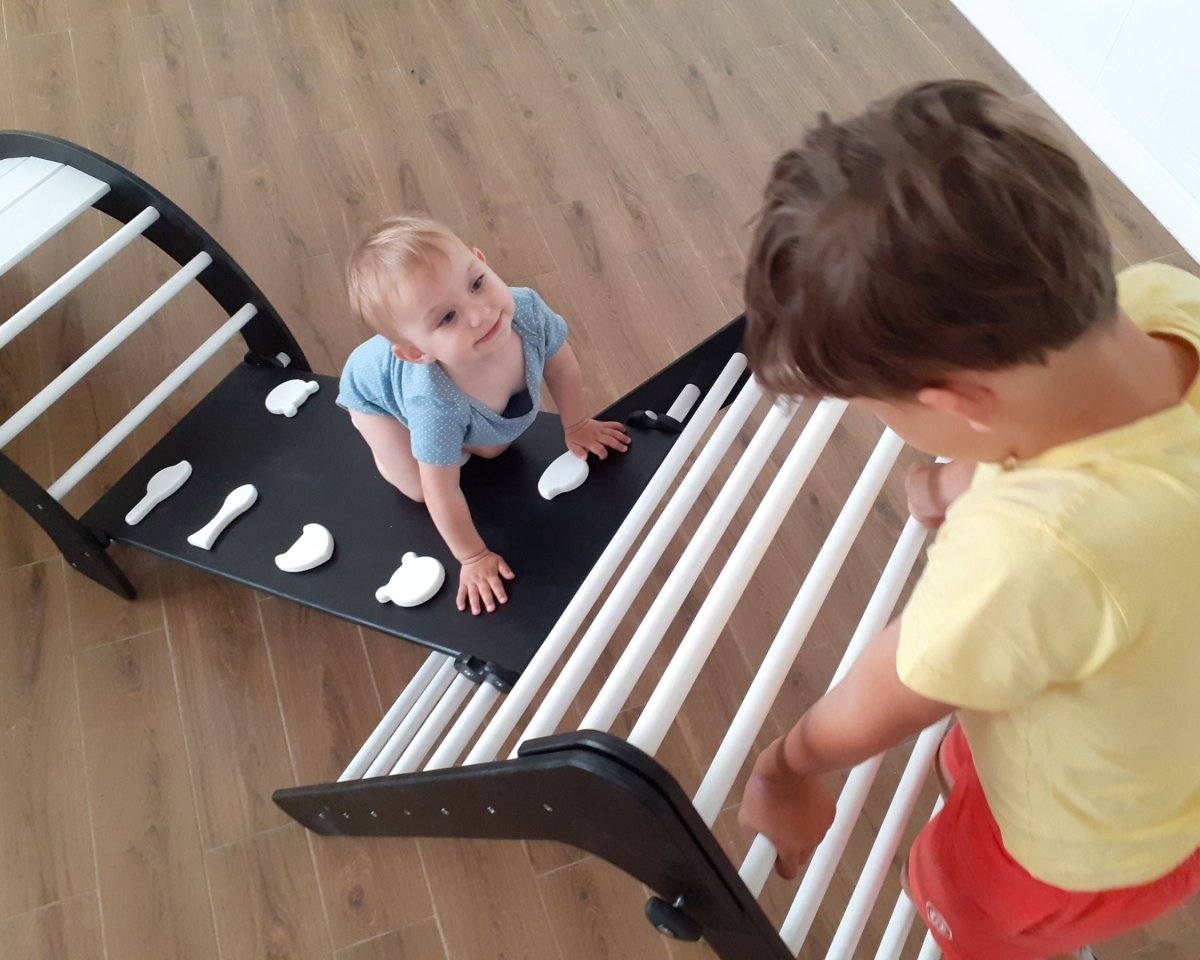 Climbing frame for toddlers with sensory play space