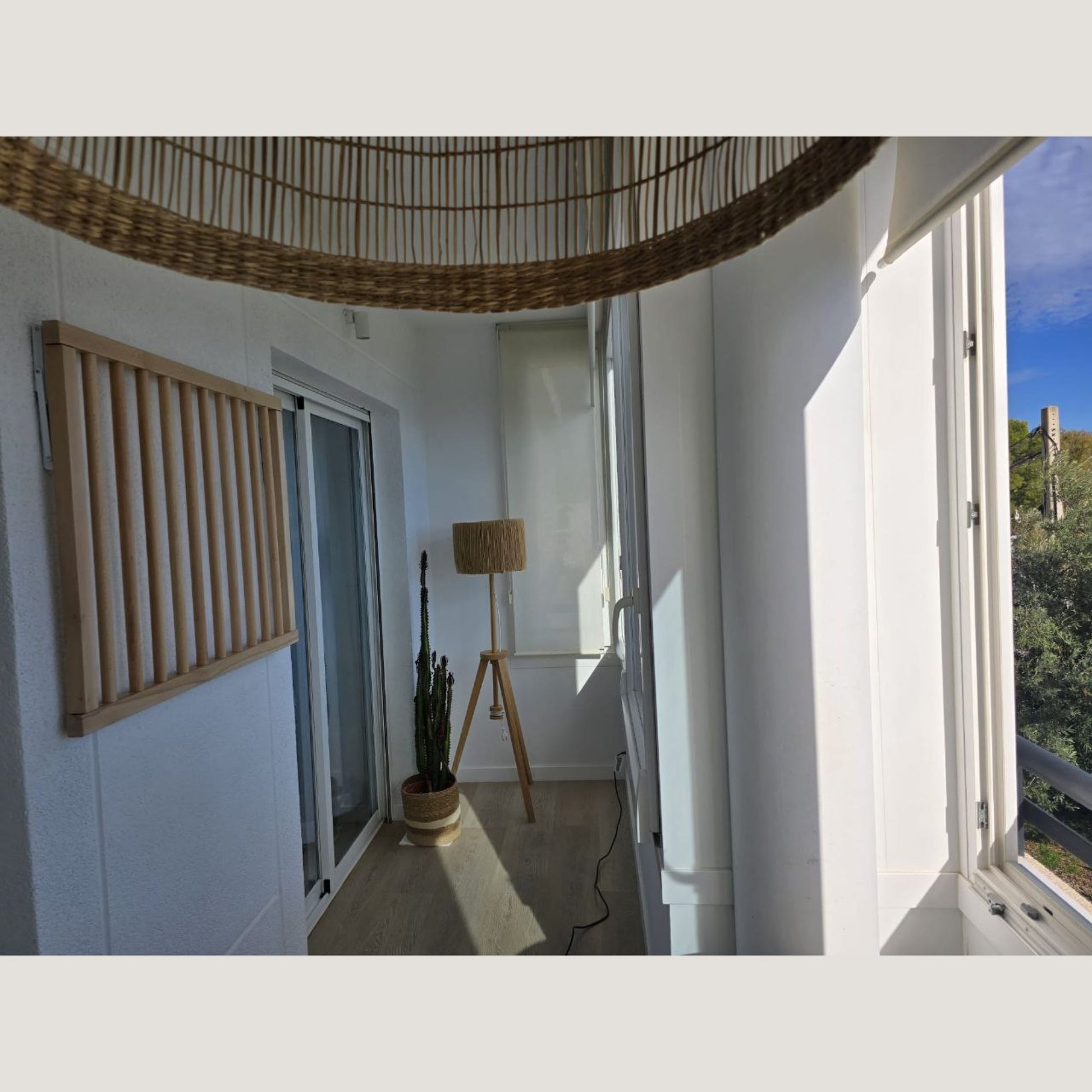 solid wood wall drying rack folded flat against wall